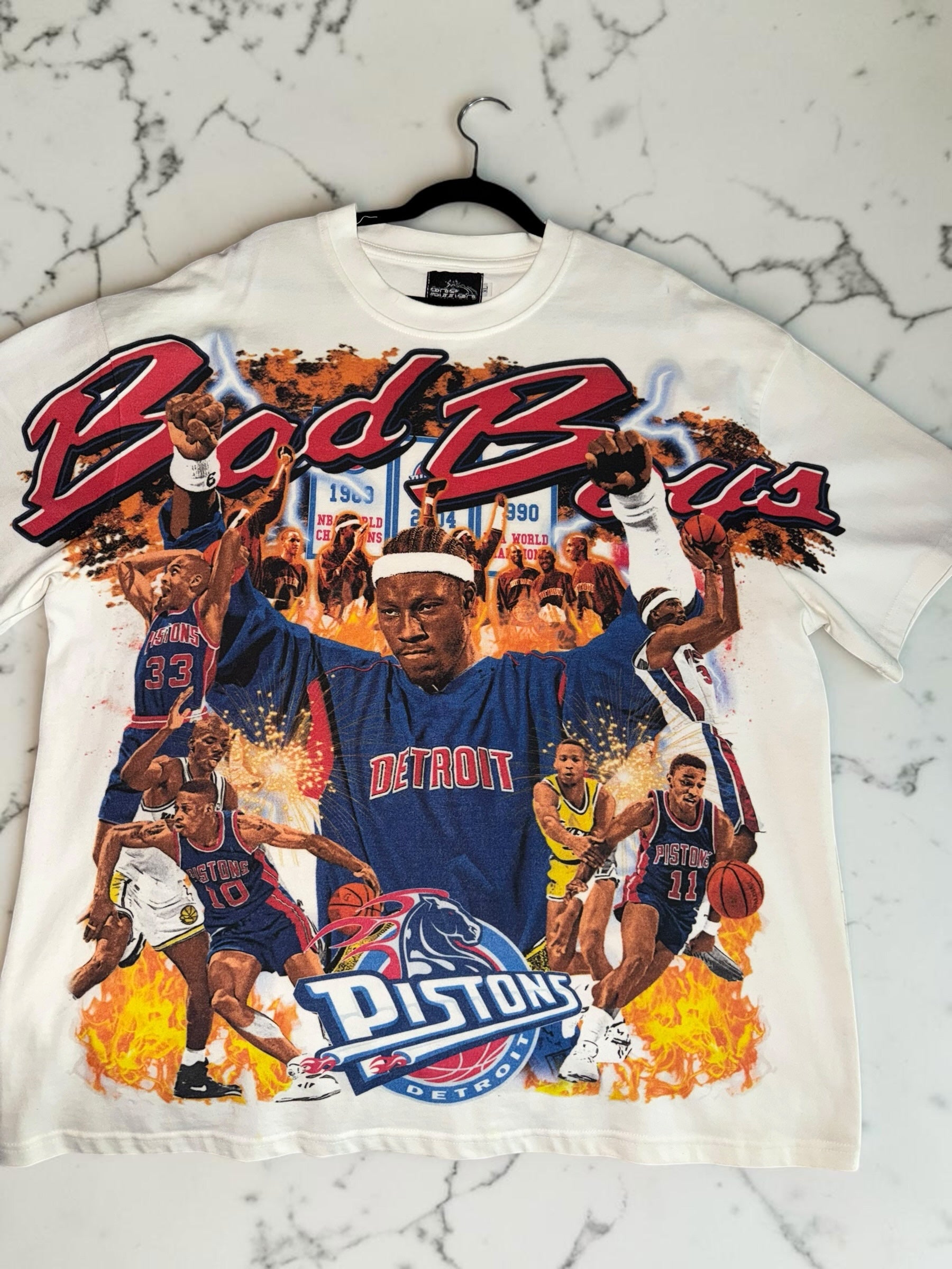 DRIPPING IN VINTY off-white Detroit Pistons Bad Boys vintage graphic t-shirt with basketball action print