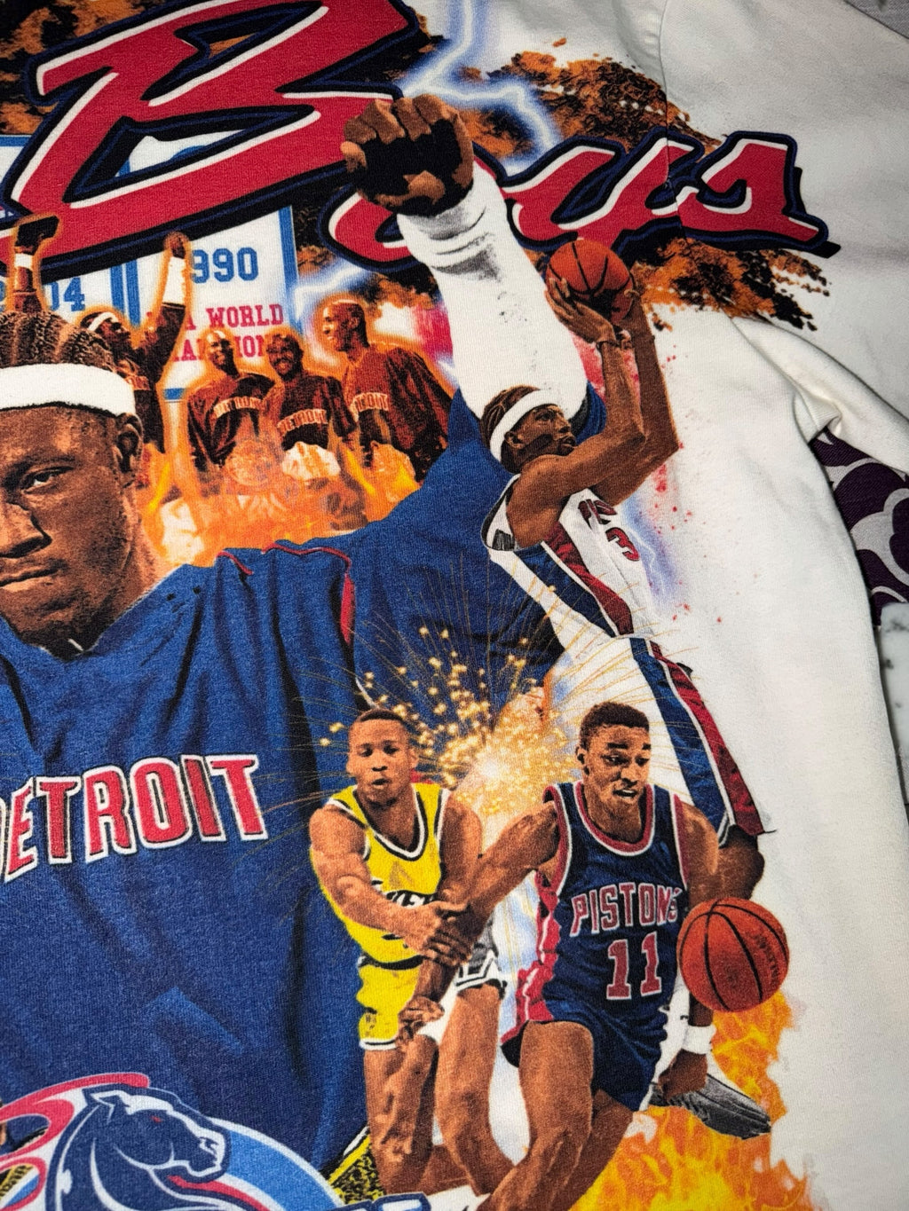 DRIPPING IN VINTY off-white vintage Detroit Pistons graphic t-shirt featuring Bad Boys era basketball player prints