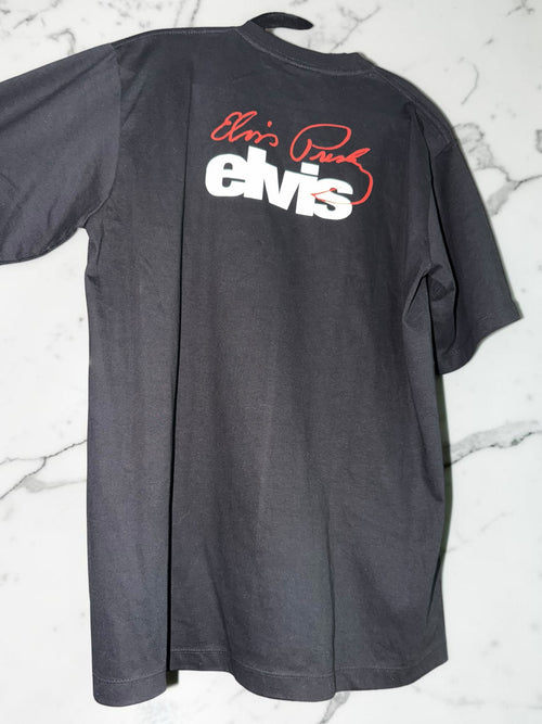 DRIPPING IN VINTY black cotton crewneck t-shirt featuring a white Elvis logo and red signature on the back