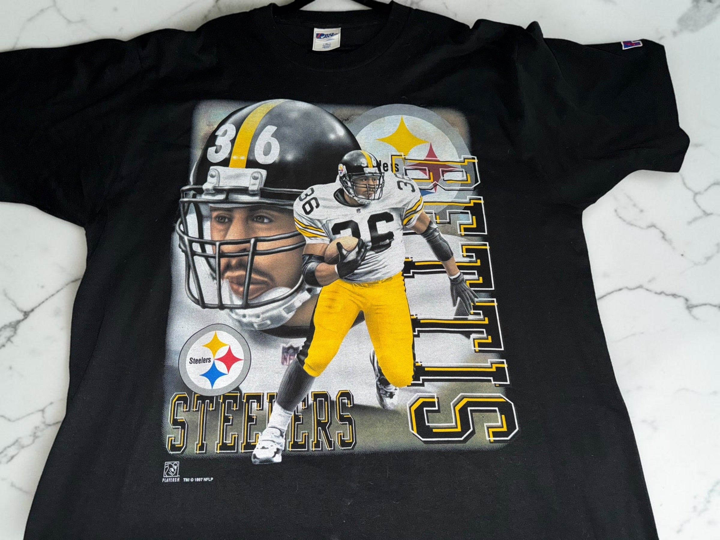 DRIPPING IN VINTY vintage black Pittsburgh Steelers cotton t-shirt with 90s player graphic and team helmet print