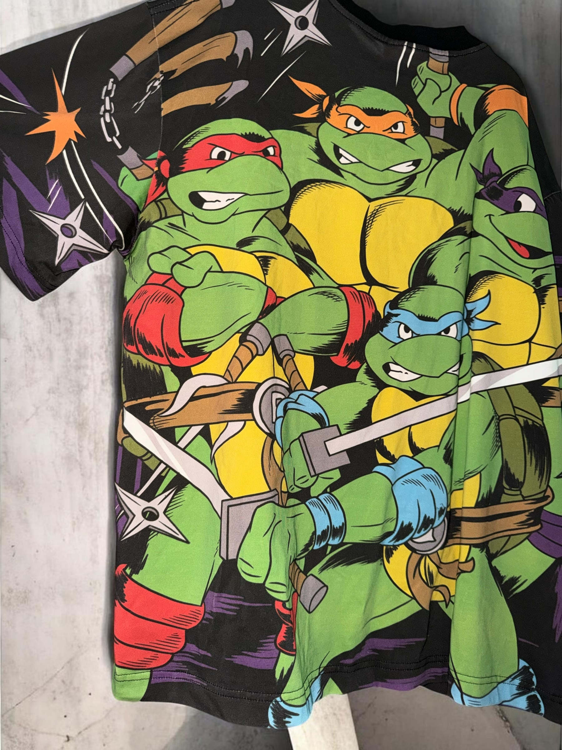 DRIPPING IN VINTY vintage Teenage Mutant Ninja Turtles graphic t-shirt with vibrant full-coverage 90s character print