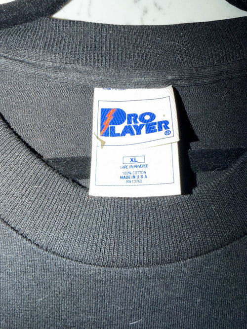 DRIPPING IN VINTY vintage black Pro Player cotton t-shirt tag showing size XL and made in USA label